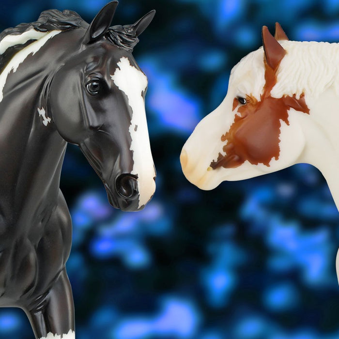 Oliver Breyer model and Legend Breyer model on blue glitter background