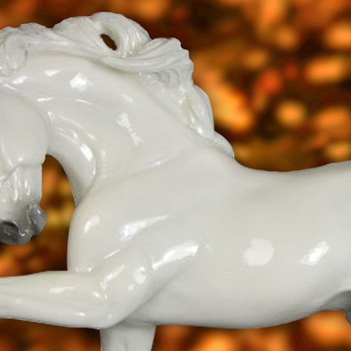 Novelisto D Breyer model on an orange glitter background