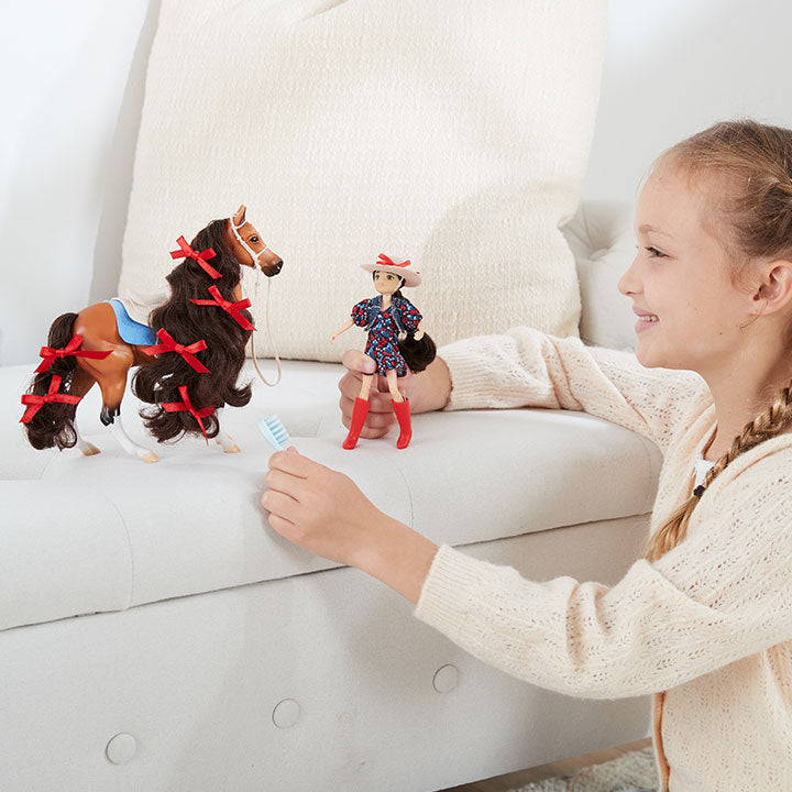 Freedom Series Collection - a child playing models on a couch
