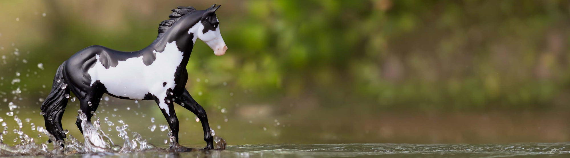Celebrate with Breyer this Weekend - Save 10%, Club Members Save More - featuring a Breyer model splashing in water.
