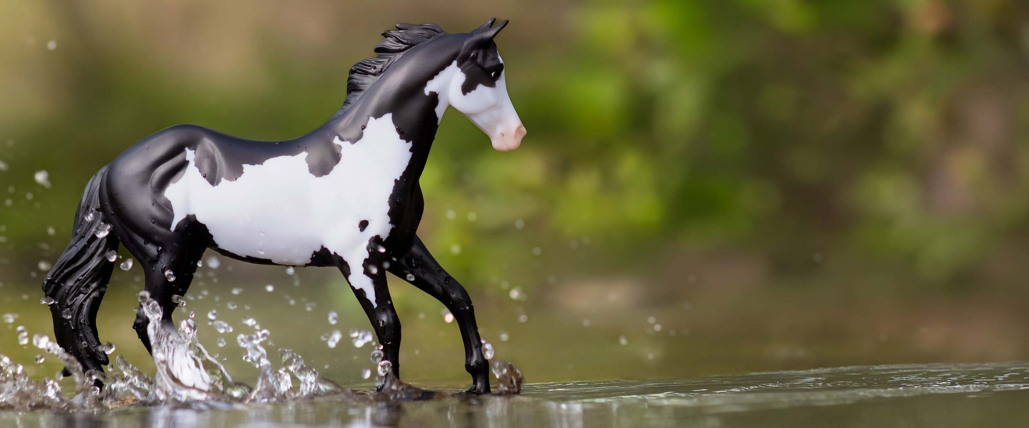 Celebrate with Breyer this Weekend - Save 10%, Club Members Save More - featuring a Breyer model splashing in water.