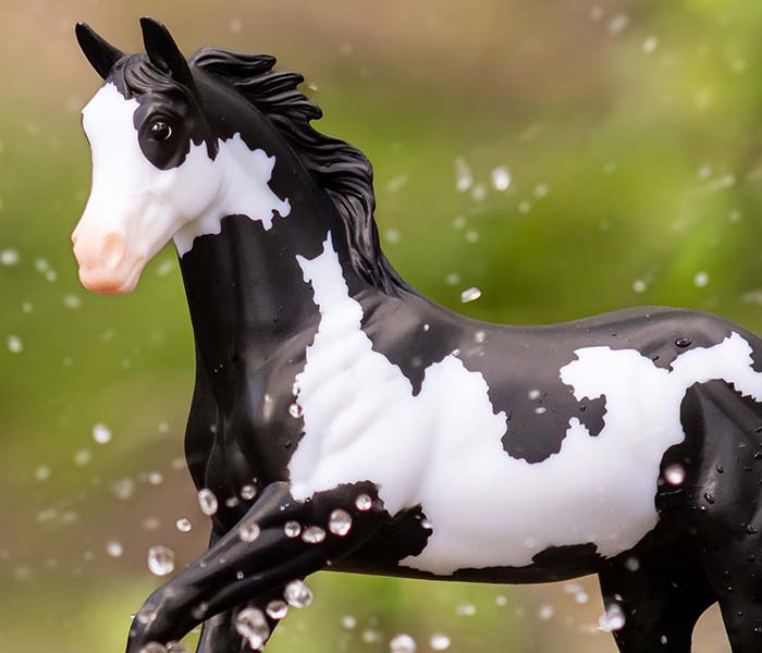 Celebrate with Breyer this Weekend - Save 10%, Club Members Save More - featuring a Breyer model splashing in water.