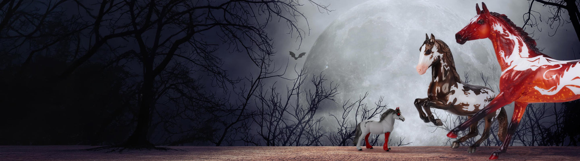 The 2026 Halloween Collection models on a creepy background with a giant moon in the background