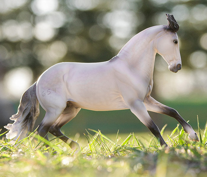 Labor Day Sale - Featuring Breyer's Jaguel Hilton model standing outside in grass