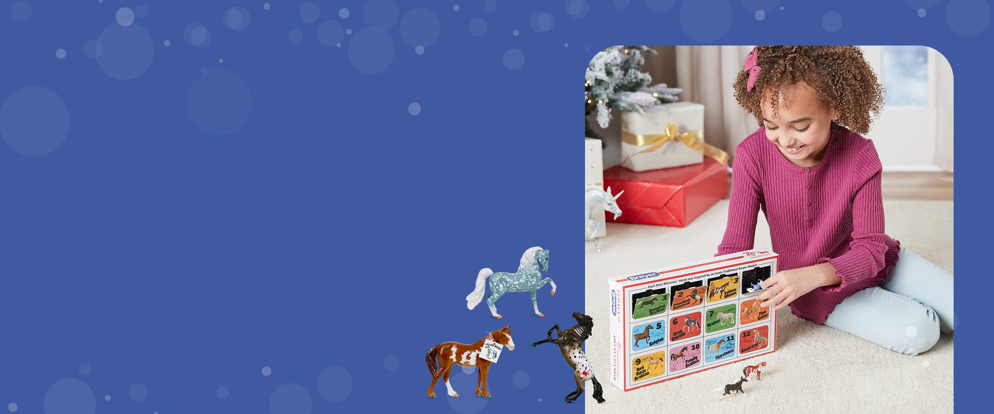 A child playing with the 75th Anniversary Edition Advent Calendar 