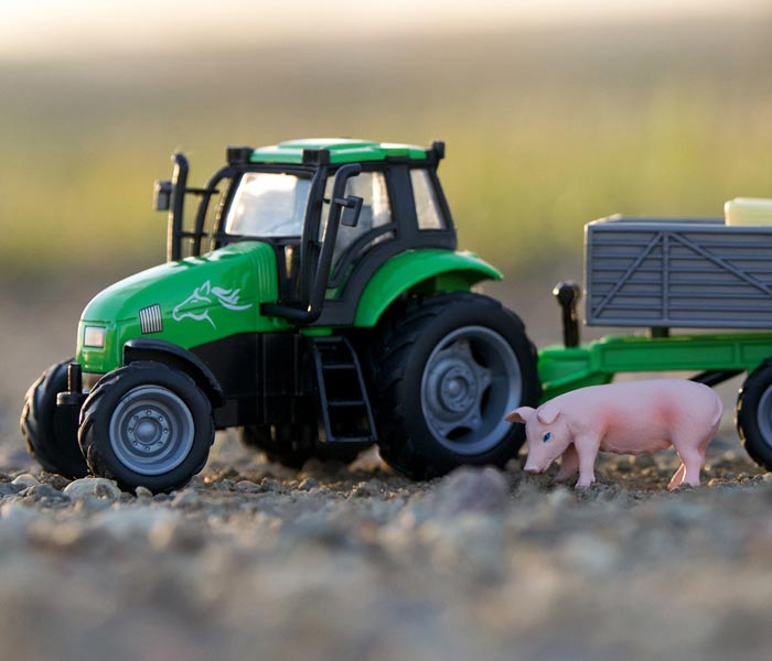 Breyer Farm Sale - Save 15% on Barns, Vehicles & Accessories - featuring a tractor