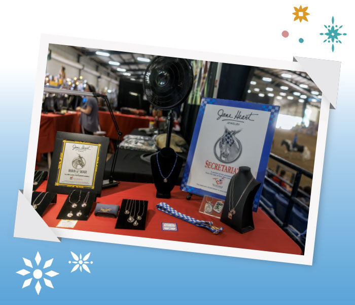 Shopping at BreyerFest featuring a table with jewelery