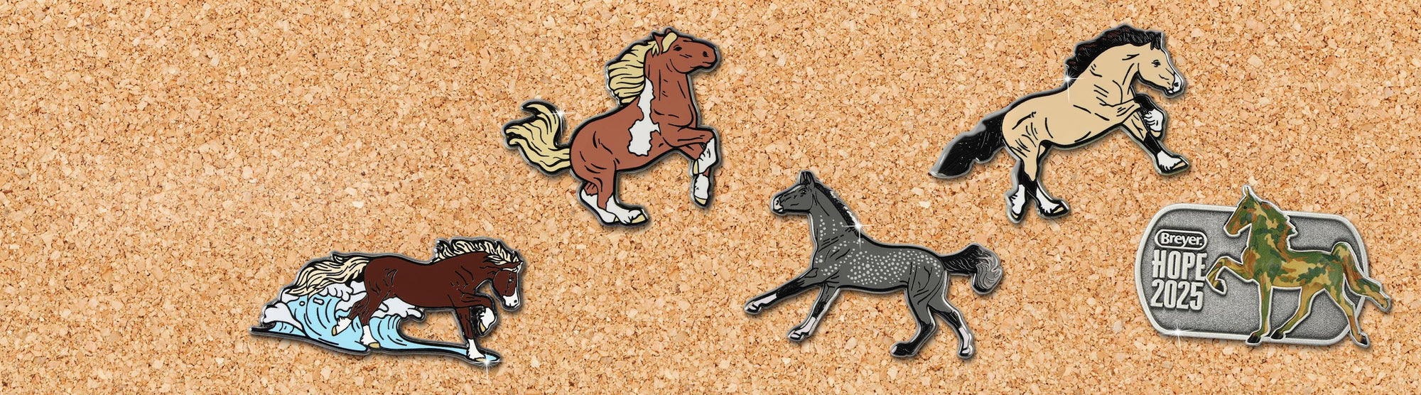Assorted Breyer pins on a corkboard