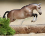 Luca - A 2027 Stablemates Club release shown jumping over a log