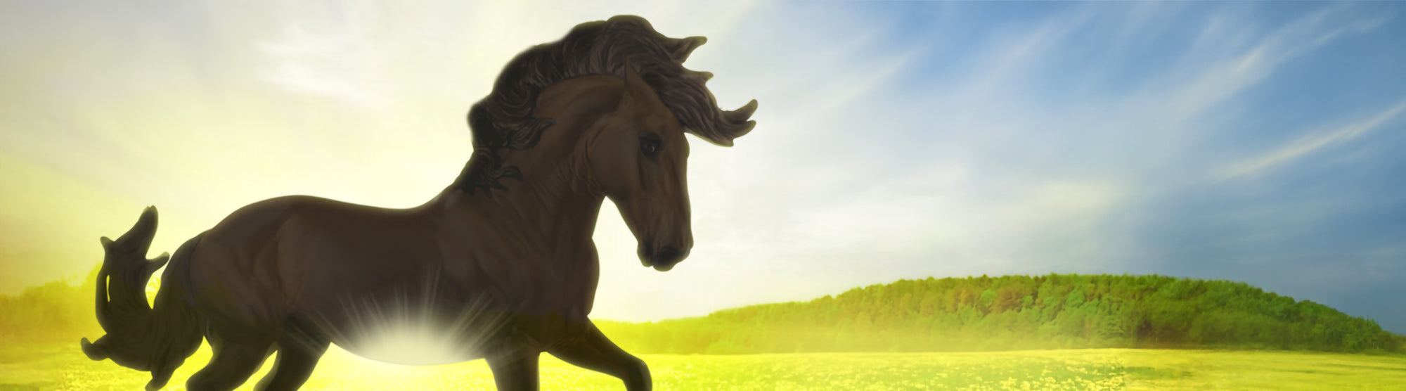 A Breyer model with sunshine emanating from under it in a grassy field 