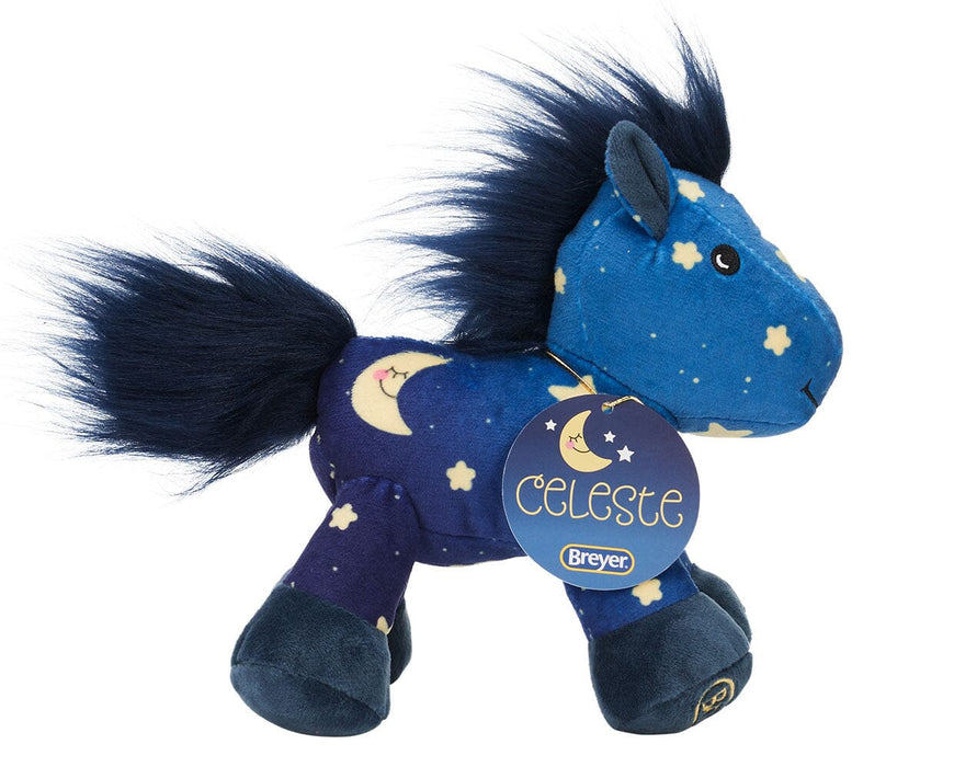 Celeste is a star-studded plush toy with a deep navy coat