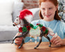A child playing with the Christmas in Bloom | 2025 Holiday Horse on a table