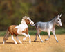 Flapjack & Waffles Breyer Models shown together in an outdoor setting
