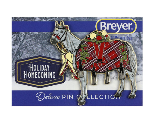 Holiday Homecoming Deluxe Enamel Pin on backer packaging