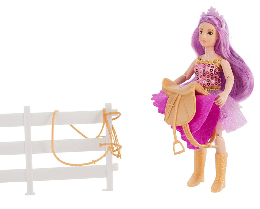 Lyra | Unicorn Rider & Tack holding tack on a white background