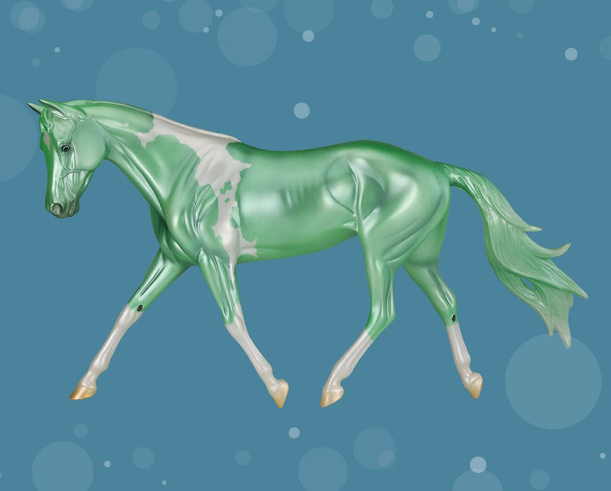 Merry_Dancer – shown in Metallic green tobiano pinto with soft blue interference 