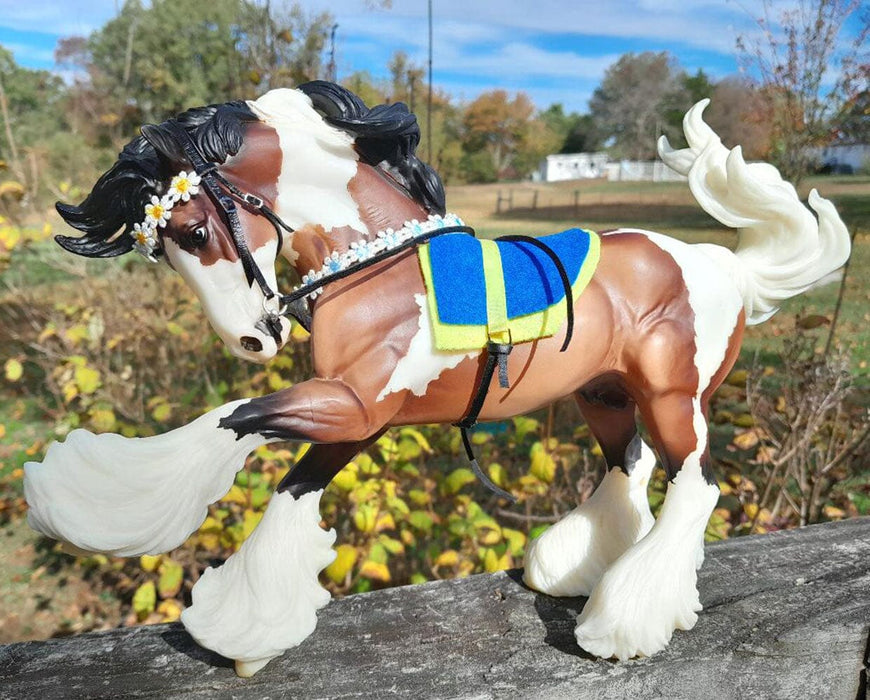 Midsummer Flower Bridles Workshop - model standing outside on wood
