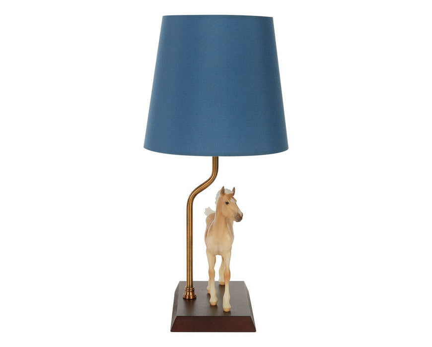 Phoebe on lamp facing forward on a white background