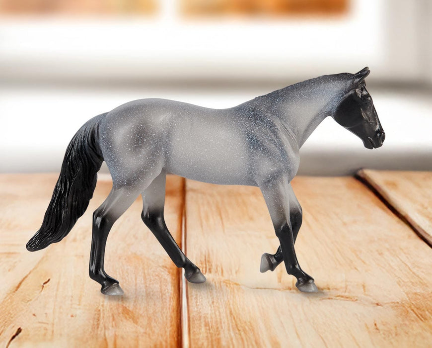 Stablemates Singles Six-Piece Assortment | Series 3 - American Quarter Horse model standing on a wooden table with a window in the background