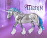 Thorin - Breyer Model Unicorn facing right on a purple background