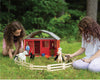 Two girls playing with the two stall barn, models and figures