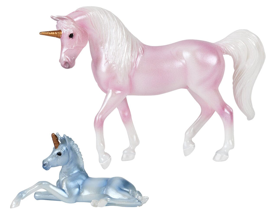 The two included models in the Unicorn Magic Carriage & Foal Playset