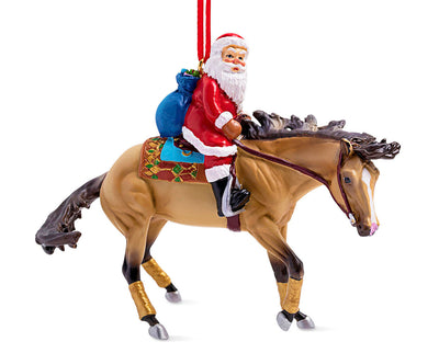 Santa Reiner | Santa Ornament Model Breyer on a white background. Santa riding a horse