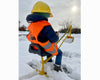 The Big Dig in the snow with a child wearing a Big Dig helmet and vest