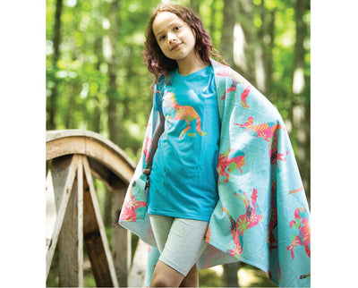 A girl wearing the Tropical Unicorn Youth T-Shirt