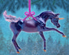 Tyrian | Unicorn Ornament Model Breyer on a blue holiday background