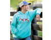 a girl wearing the Unisex Southwest Hoodie and Breyer cap