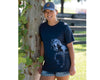 Model wearing the Women's Friesian Horse T-Shirt and Logo Patch Hat